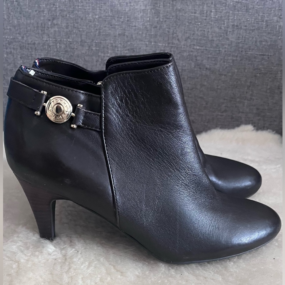 A pair of Tommy Hilfiger brown booties